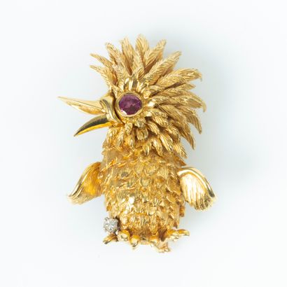 Broche oiseau en or sertie d'un rubis et...