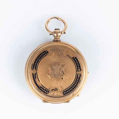 Montre de col en or guilloché et émaillé...