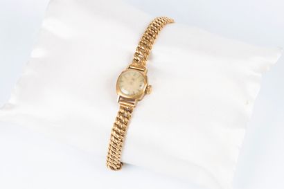 Bracelet-montre de dame en or, le bracelet...