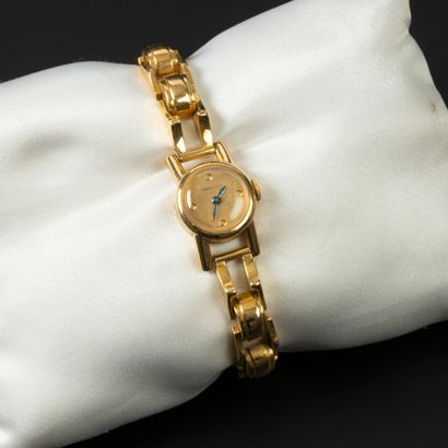 Bracelet-montre de dame en or, le bracelet...