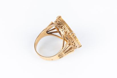 Bague en or sertie d'une monnaie de 20 FF...