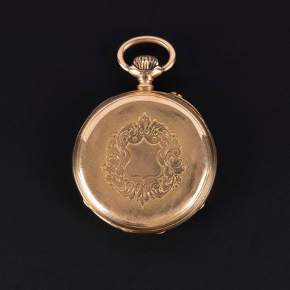 Montre de poche en or guilloché et gravé...