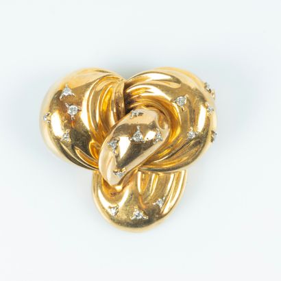 Importante broche noeud en or sertie de 17...