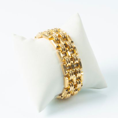 Bracelet articulé en or, les maillons alterné...