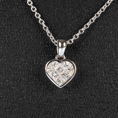 Pendentif coeur serti de 8 diamants princesses...