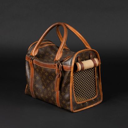 LOUIS VUITTON. Sac de voyage pour chien ou...
