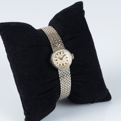 ELECTRA. Montre de dame en or gris, bracelet...