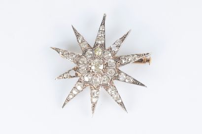 Broche étoile en or et argent entièrement...