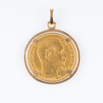 Pendentif en or serti d'une pièce de 20 FF...