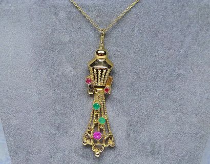 Pendentif articulé en or rehaussé de pierres...