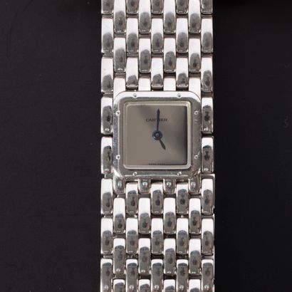 CARTIER. Montre de dame en acier, modèle...