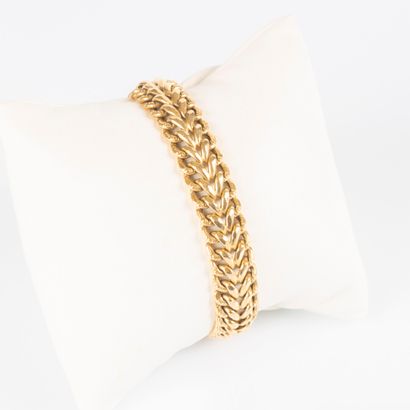 Bracelet en or maille américaine. 28,58 g....
