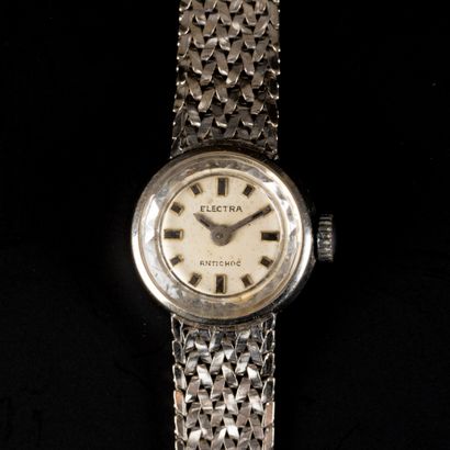 ELECTRA. Montre de dame en or gris, bracelet...