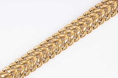Bracelet en or maille américaine. 28,58 g....