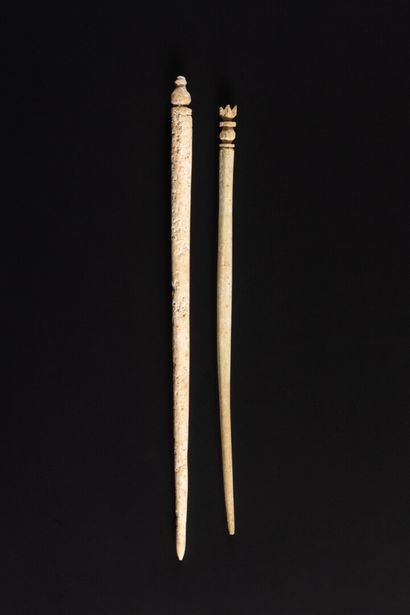 Set of two pins, one ended by a pomegranate,...