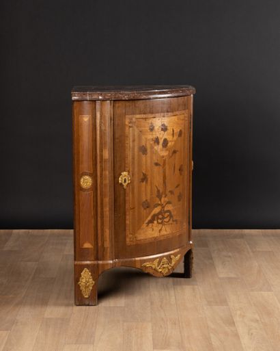 A marquetry inlaid cabinet with amaranth...