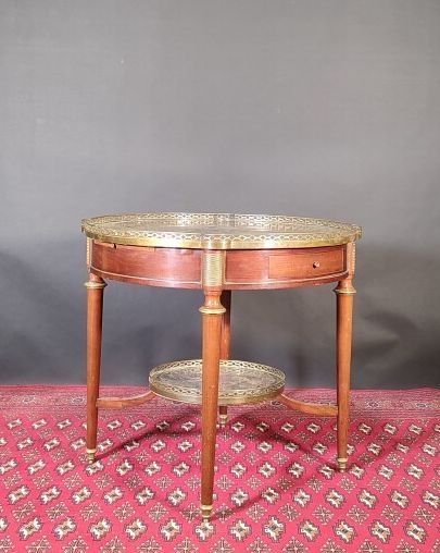 Round mahogany and mahogany veneer pedestal...