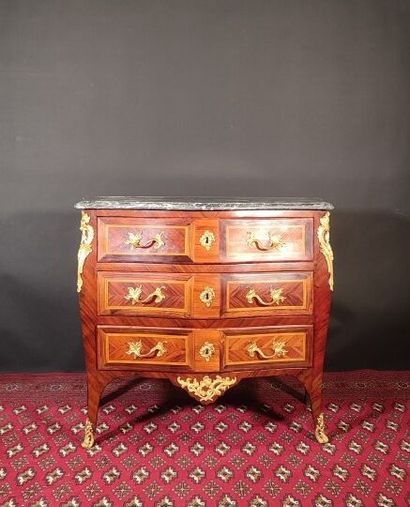 Small curved chest of drawers in rosewood...
