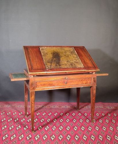 Mahogany and mahogany veneer table with ebony...