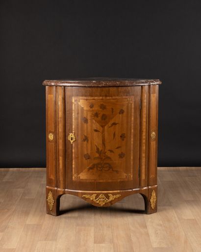 A marquetry inlaid cabinet with amaranth...