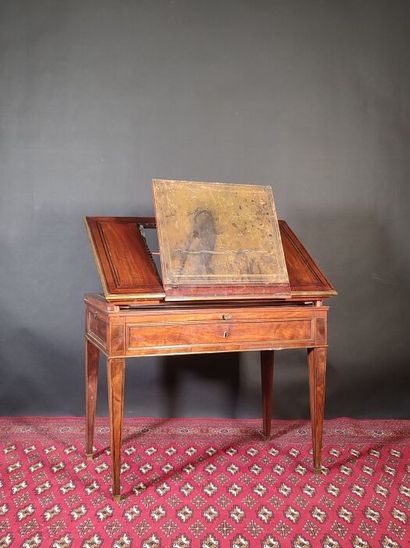 Mahogany and mahogany veneer table with ebony...