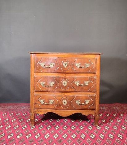Small arched chest of drawers in molded walnut,...