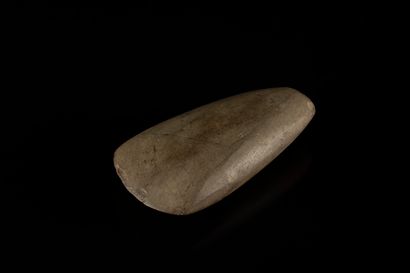 Small polished axe
Greenish stone
France,...
