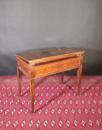 Mahogany and mahogany veneer table with ebony...