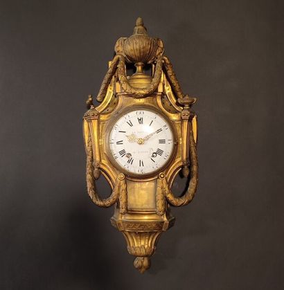 Gilt bronze wall clock decorated with an...