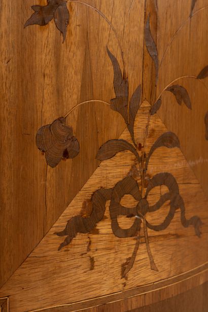 A marquetry inlaid cabinet with amaranth...