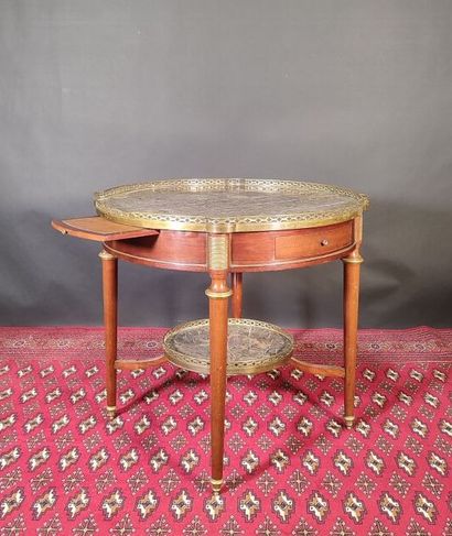 Round mahogany and mahogany veneer pedestal...