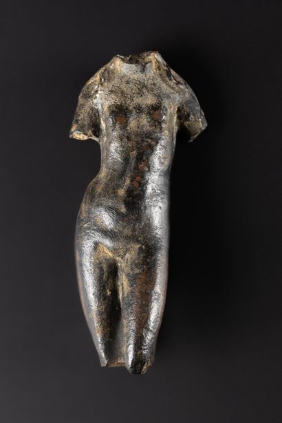 Naked female statuette. It is most probably...
