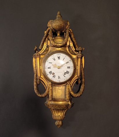 Gilt bronze wall clock decorated with an...