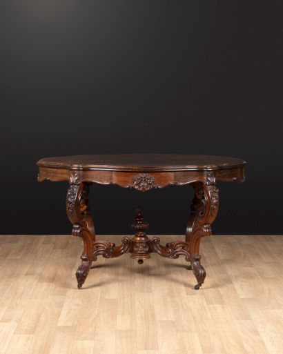 Carved and molded rosewood middle table with...