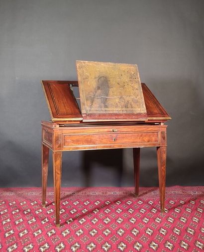 Mahogany and mahogany veneer table with ebony...