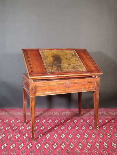 Mahogany and mahogany veneer table with ebony...