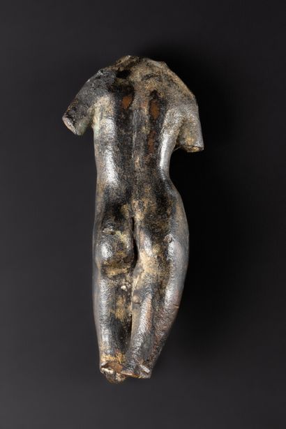 Naked female statuette. It is most probably...