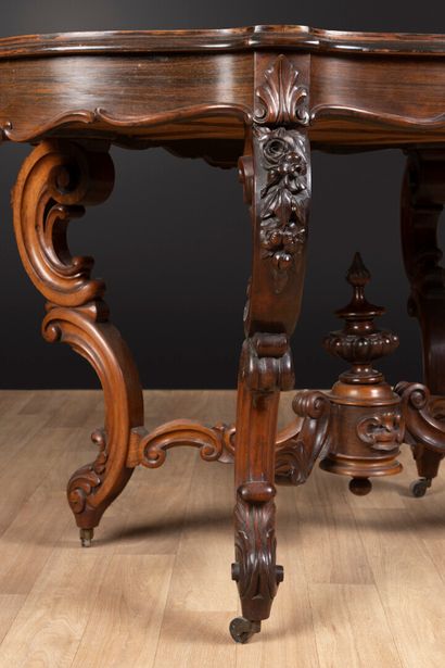 Carved and molded rosewood middle table with...