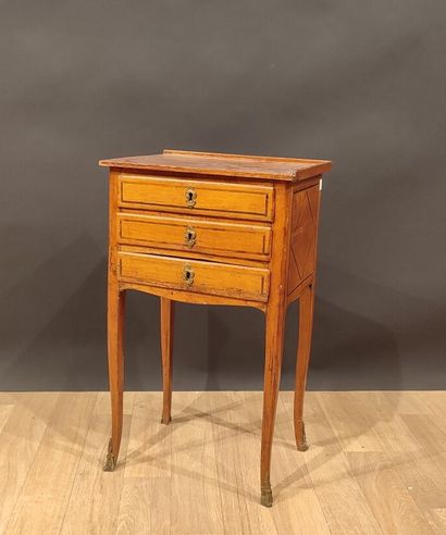 Table chiffonnière in veneer and marquetry...