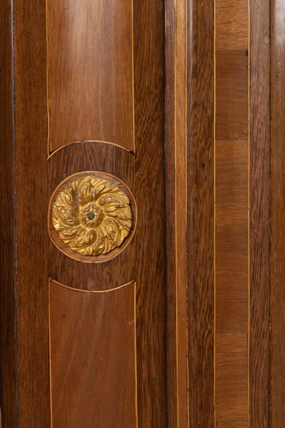 A marquetry inlaid cabinet with amaranth...