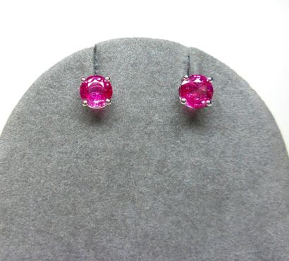 Pair of white gold stud earrings set with...