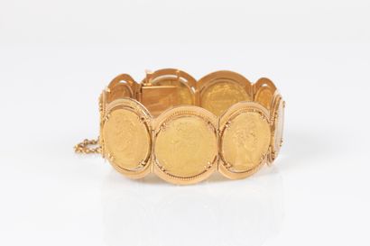 Important bracelet en or jaune 18K 750 millièmes...