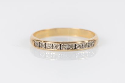 Wedding ring in yellow gold set with 9 small...