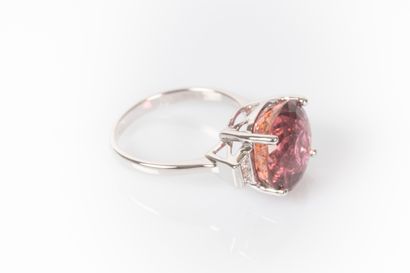 White gold ring set with a round tourmaline...