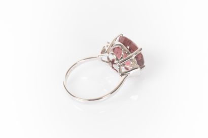 White gold ring set with a round tourmaline...