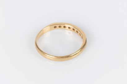Wedding ring in yellow gold set with 9 small...