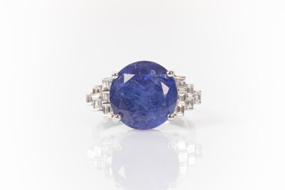 White gold ring set with a round tanzanite...