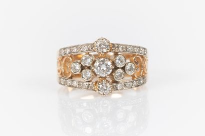 Bague jarretière en or jaune et gris 18K...