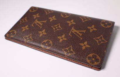 LOUIS VUITTON. Portefeuille en toile monogrammée....