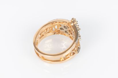 Bague jarretière en or jaune et gris 18K...